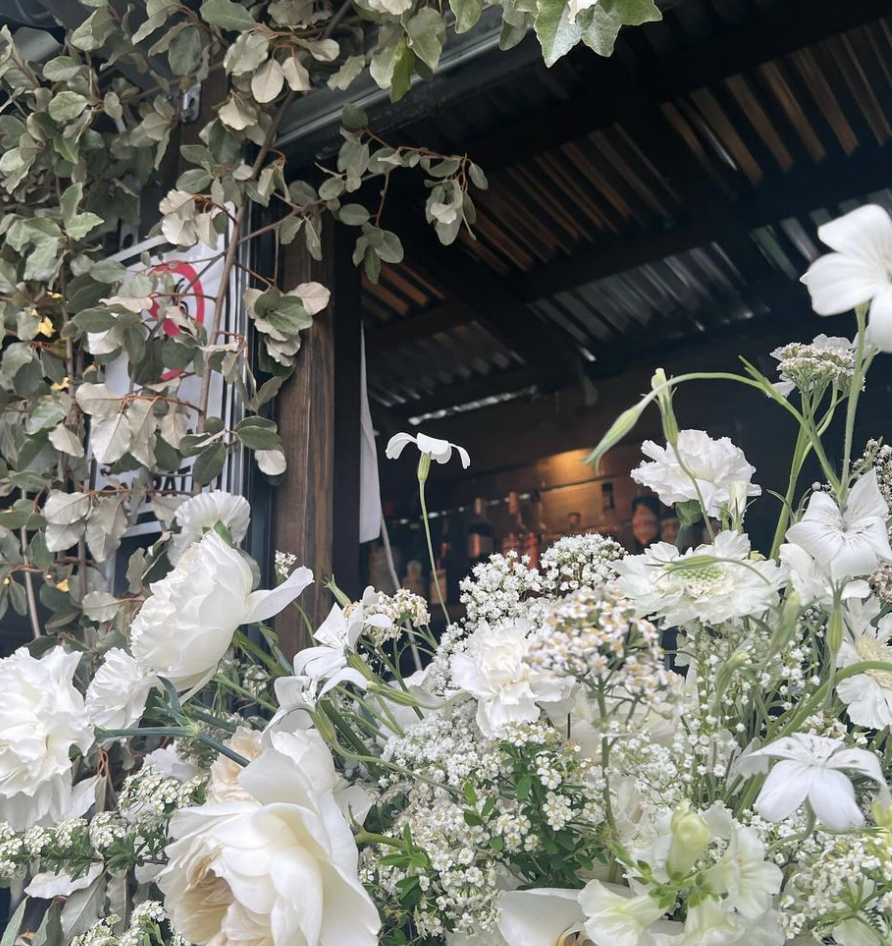 Private event and wedding venues in Raleigh, North Carolina, featuring elegant settings like Botanical Lounge with its lush greenery, Hibernian Pub for corporate events, and Watts & Ward for intimate gatherings.